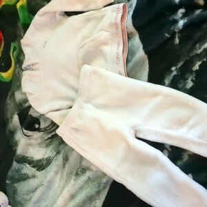 This is a gently used little girls. 18-month Calvin Klein matching outfit